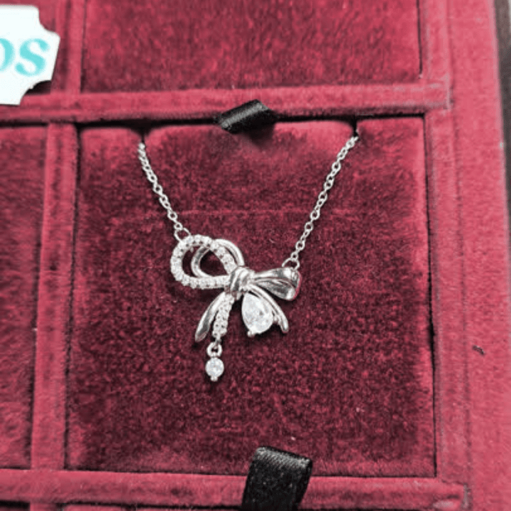 Graceful Glamour: Zircon Bow Pendant Necklace - Silver Signature - Necklace - Coastal Charm Creators