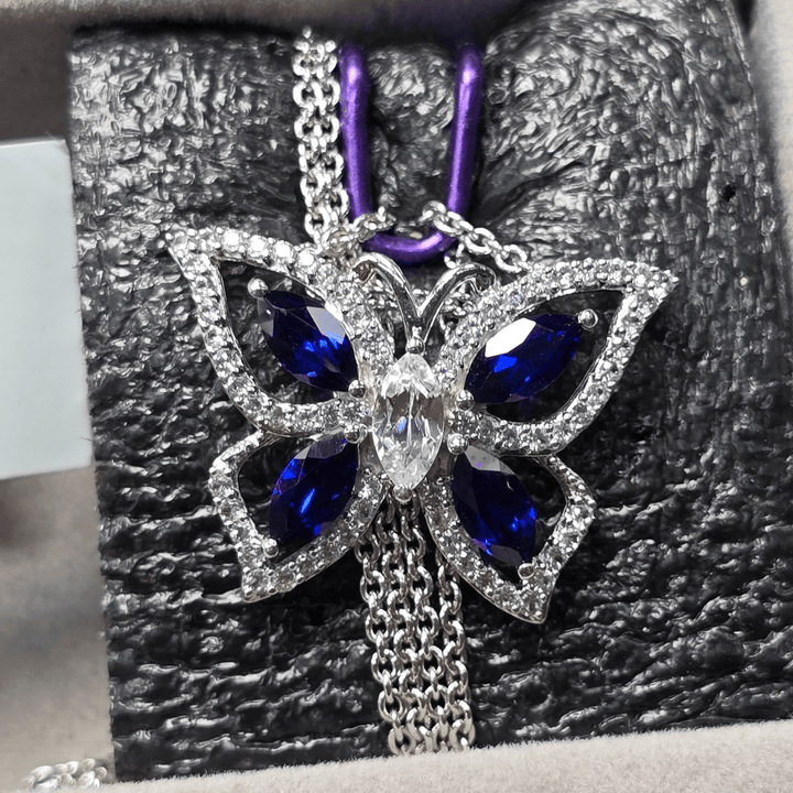 Majestic Flight: Sapphire Butterfly Pendant Necklace - Crown & Opal - Necklace - Coastal Charm Creators