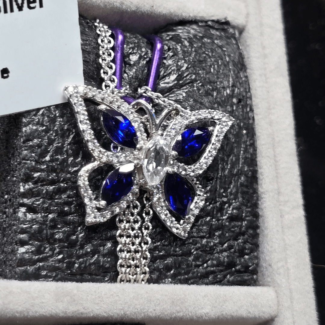 Majestic Flight: Sapphire Butterfly Pendant Necklace - Crown & Opal - Necklace - Coastal Charm Creators