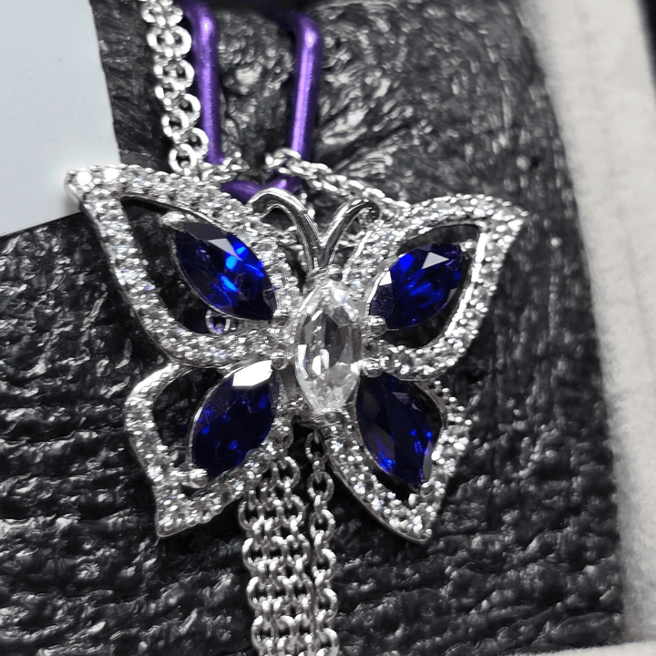 Majestic Flight: Sapphire Butterfly Pendant Necklace - Crown & Opal - Necklace - Coastal Charm Creators